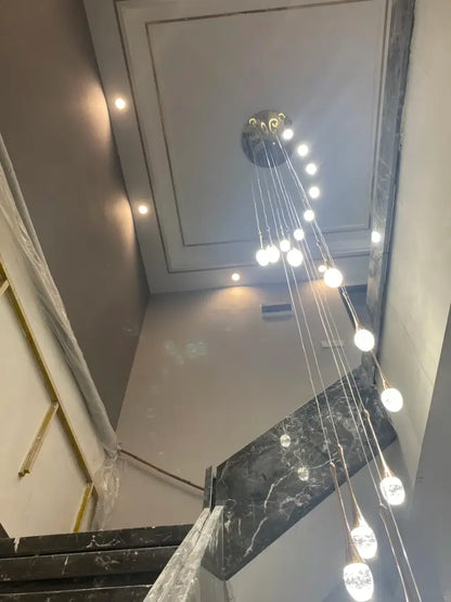 DecorBites™ modern led crystal chandelier with circular chrome fixture and multiple dangling spherical bulbs for home decor