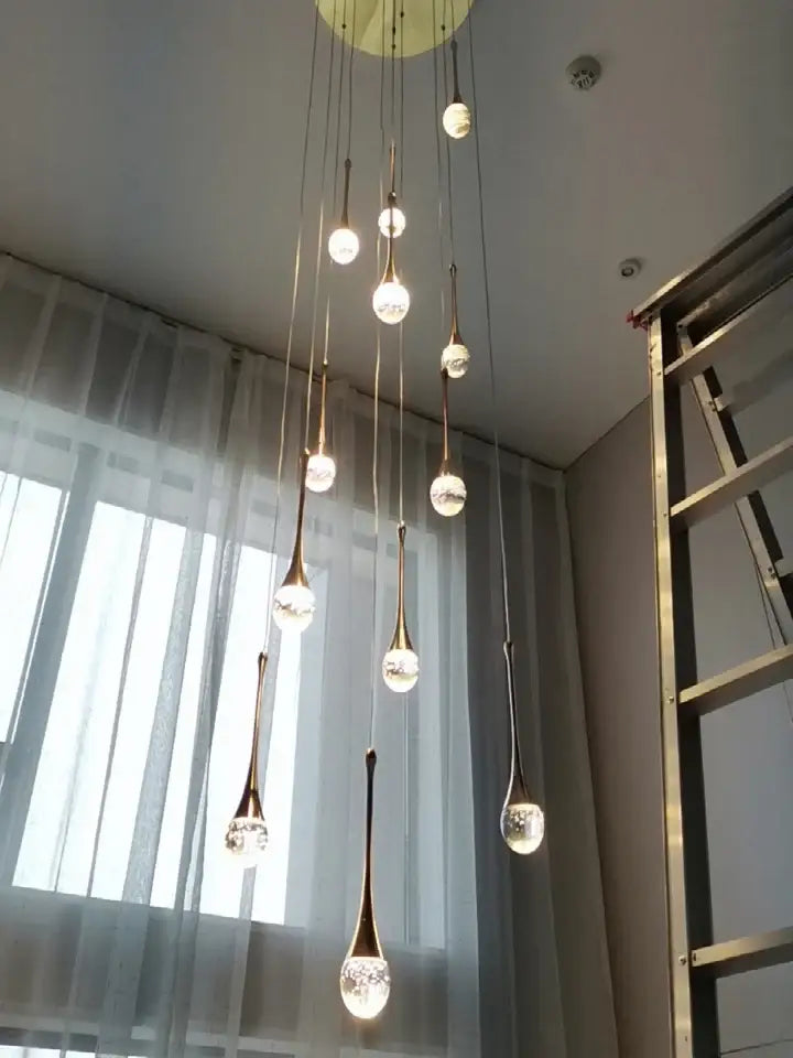 Decorbites™ modern led crystal chandelier with teardrop glass pendants on circular brass fixture for home decor