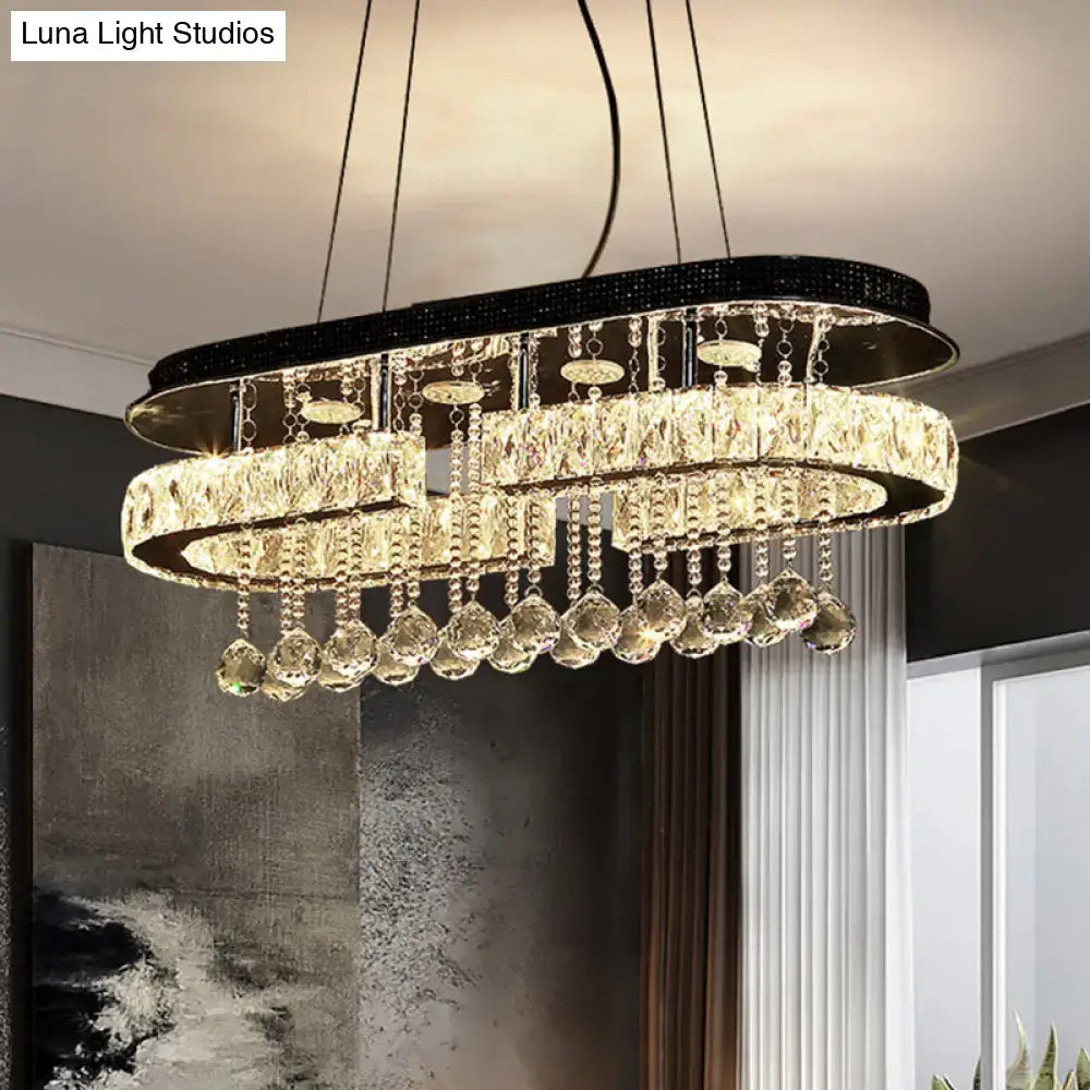 Elegant oval-shaped modern led crystal pendant light with black beaded top frame and stainless steel accents