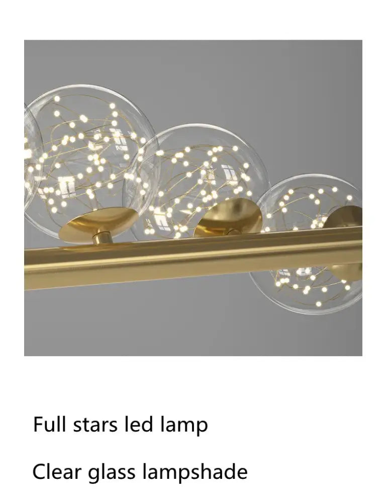 Gold-finished DecorBites™ modern led glass chandelier with clear globe shades and star-like embedded lights for dining room