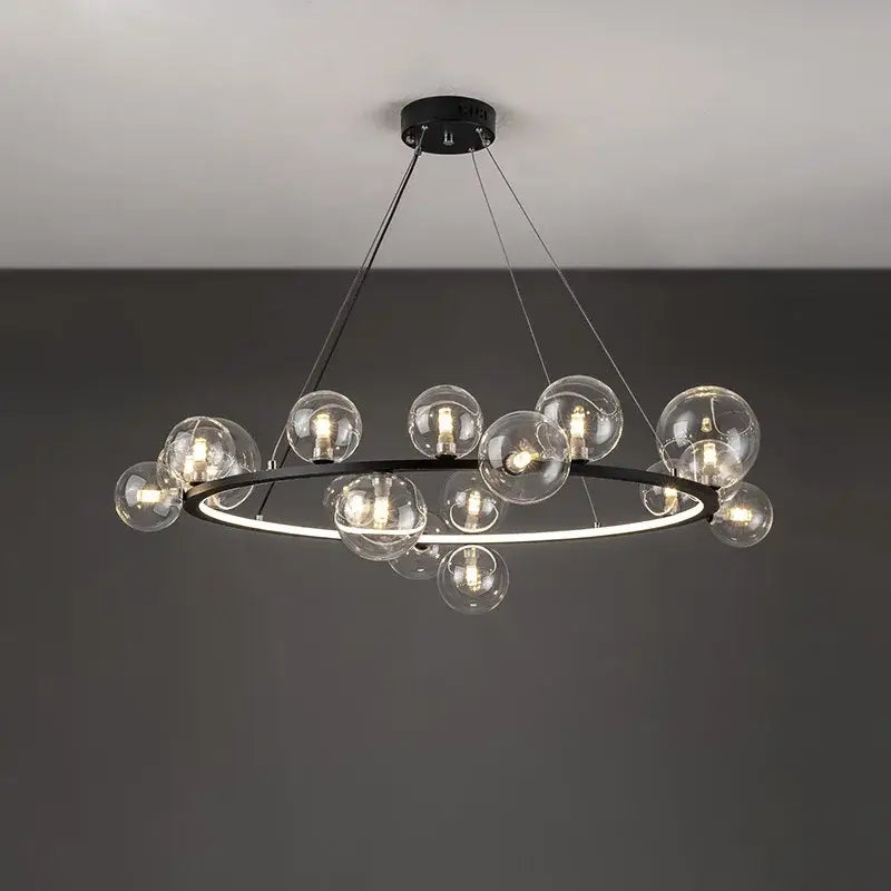 Modern black metal chandelier with clear glass bubble bulbs arranged in a circular pattern and adjustable cord