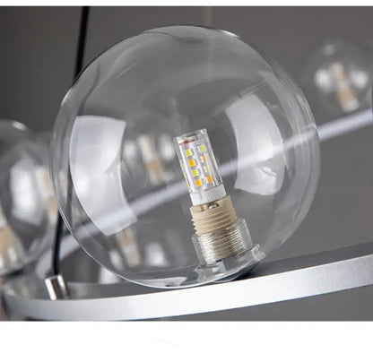 Decorbites™ modern led glass chandelier featuring a clear glass bubble globe with visible leds and an adjustable cord