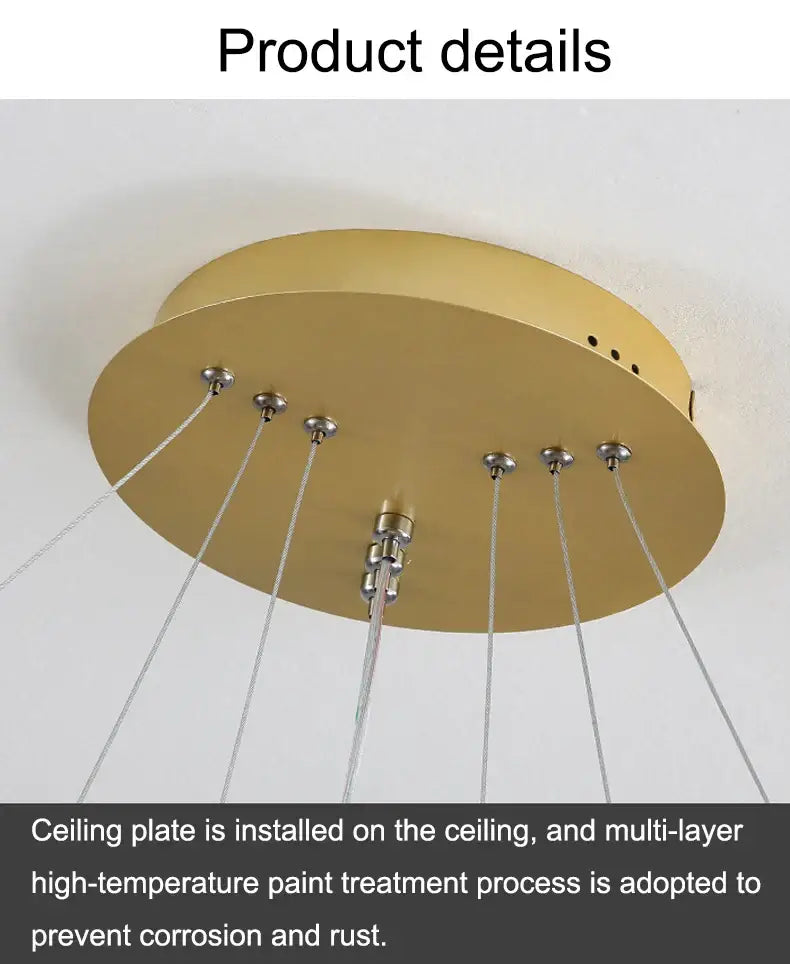 Gold-colored circular ceiling plate with brushed metal finish and multiple suspension points for decorbites™ modern pendant lamp