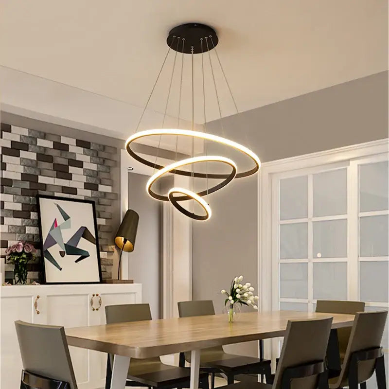 DecorBites modern black and gold spiral pendant lamp with dimmable warm white LED rings and adjustable brightness