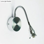 Modern chrome gooseneck sconce lamp with silver metallic finish direct wired electric for bedroom use