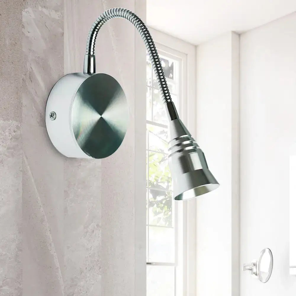 A sleek modern chrome gooseneck sconce lamp with flexible arm and direct wired electric installation