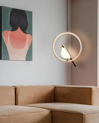 Decorbites modern magpie bird led pendant light featuring a glowing bird-shaped circular lampshade suspended by a cord