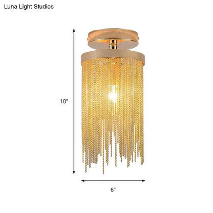Gold-toned decorbites semi flush mount lamp with cascading crystal chains and sleek modern metal design for living room