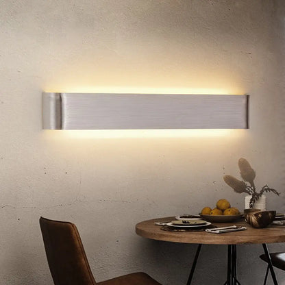 Modern metal wall sconces by DecorBites™ feature brushed silver rectangular design with warm ambient lighting