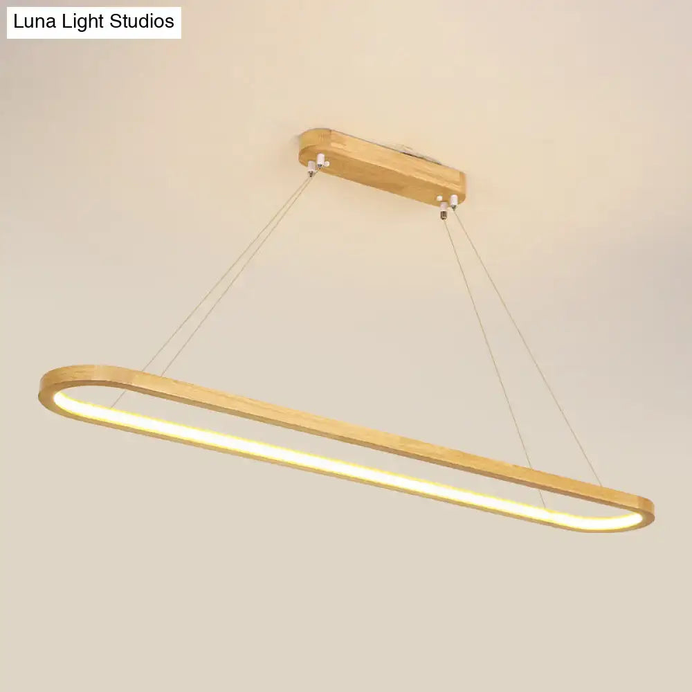 Modern minimalist wooden LED strip pendant light with warm glow, natural wood, metal cords, suitable for 110v-120v and 220v-240v