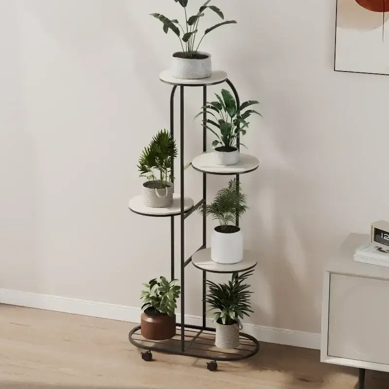 Black metal DecorBites™ modern plant stand with five white marble shelves and caster wheels for interior decor