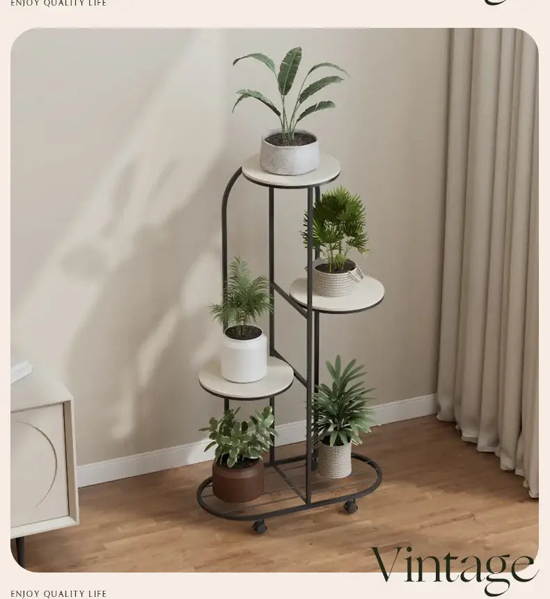 DecorBites™ modern black metal plant stand with four white circular shelves and caster wheels for interior decor