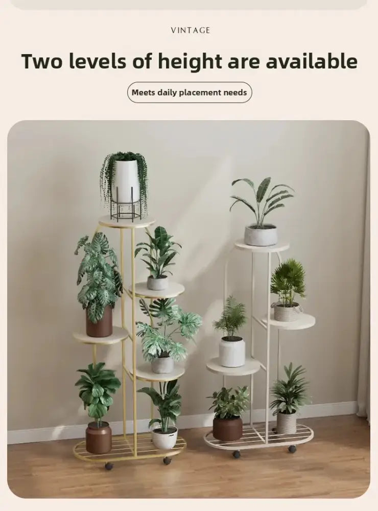 Gold-colored metal multi-storey plant stand with wheels by DecorBites for stylish interior decor and flower rack display