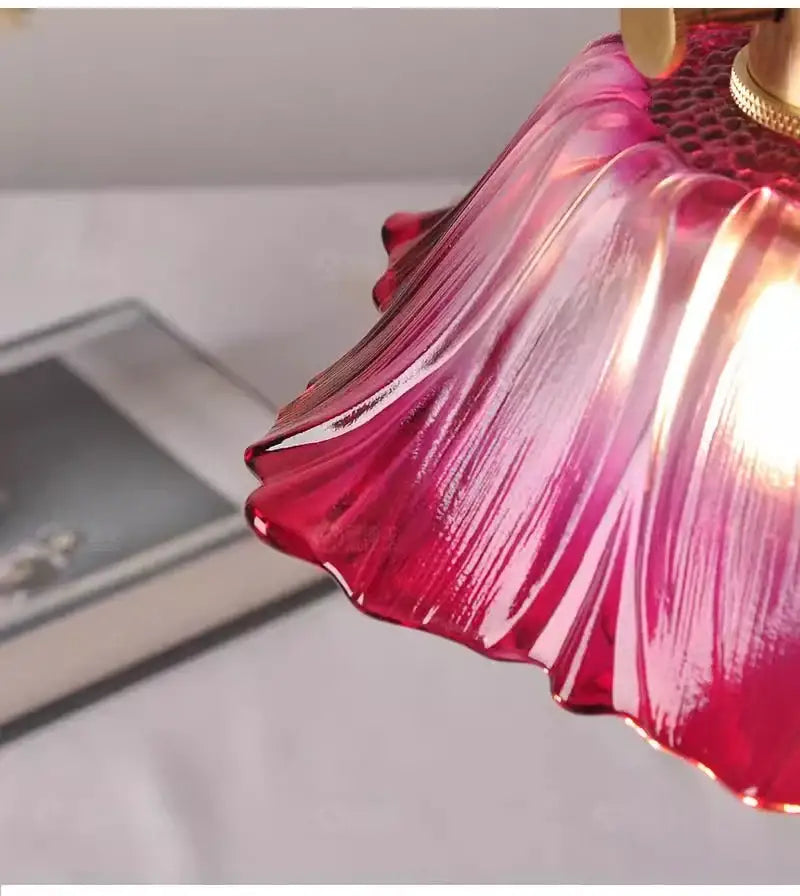 A vibrant hand-blown glass lampshade with red to pink gradient and ridges in decorbites e27 ceiling lights