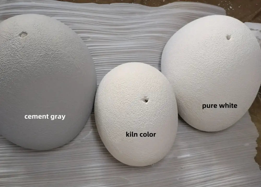 Three ceramic egg-shaped lamps in cement gray kiln color and pure white for warm light modern nordic chandelier use