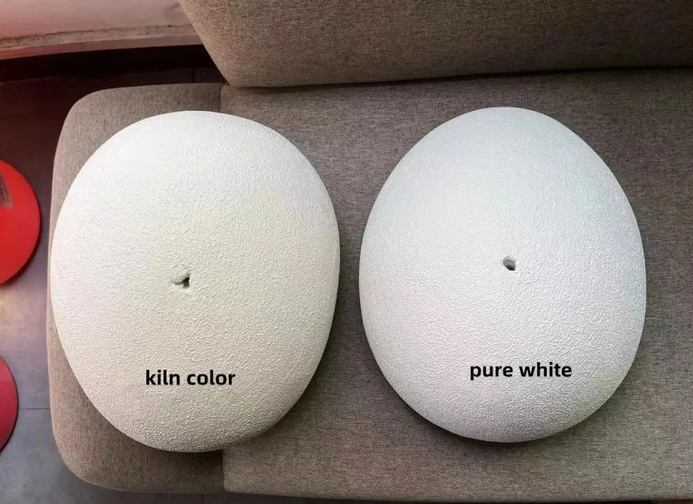 Two oval textured white stone-like samples labeled kiln color and pure white for decorbites modern nordic chandelier warm light turn