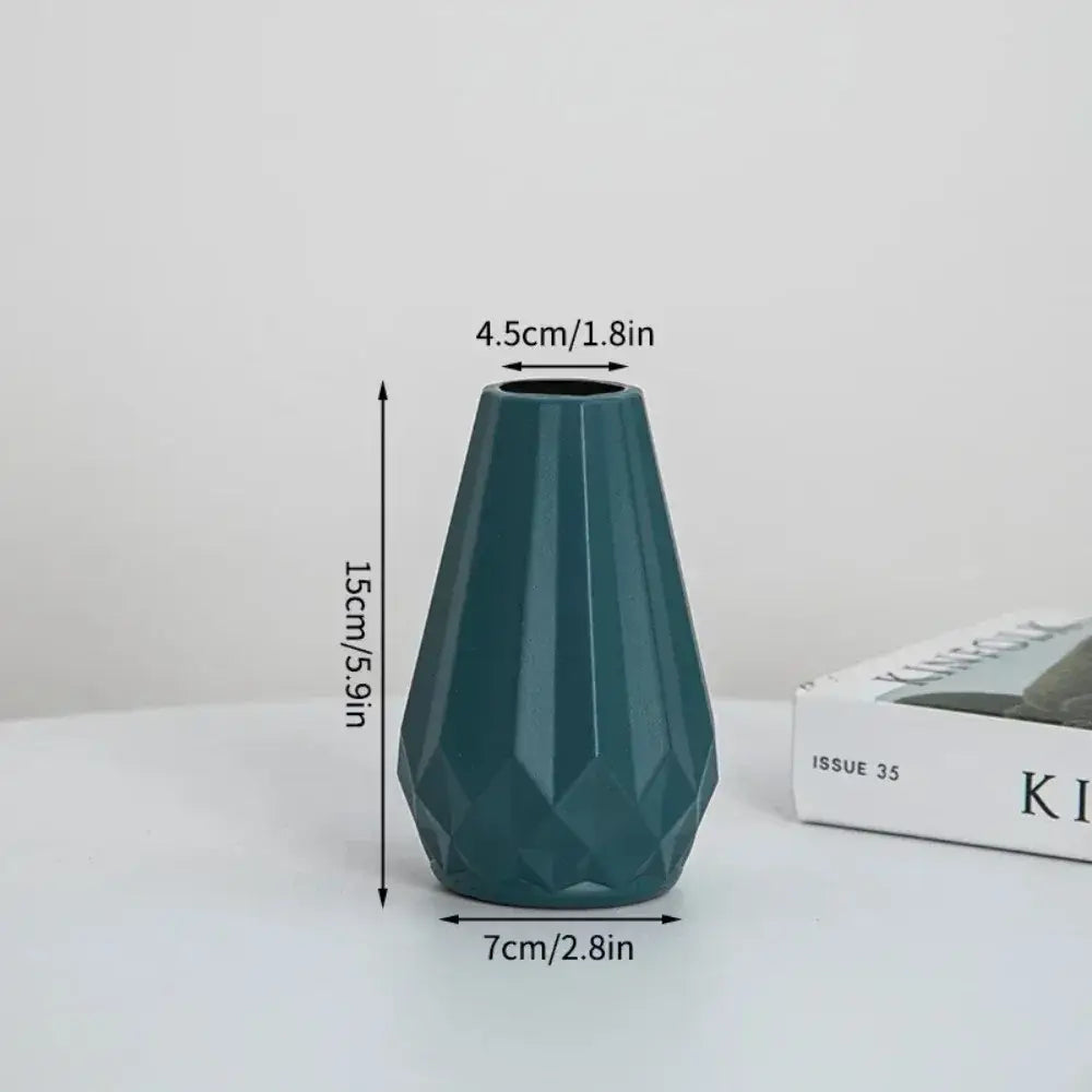 Teal ceramic flower vase with a faceted diamond shaped design by decorbites modern nordic collection