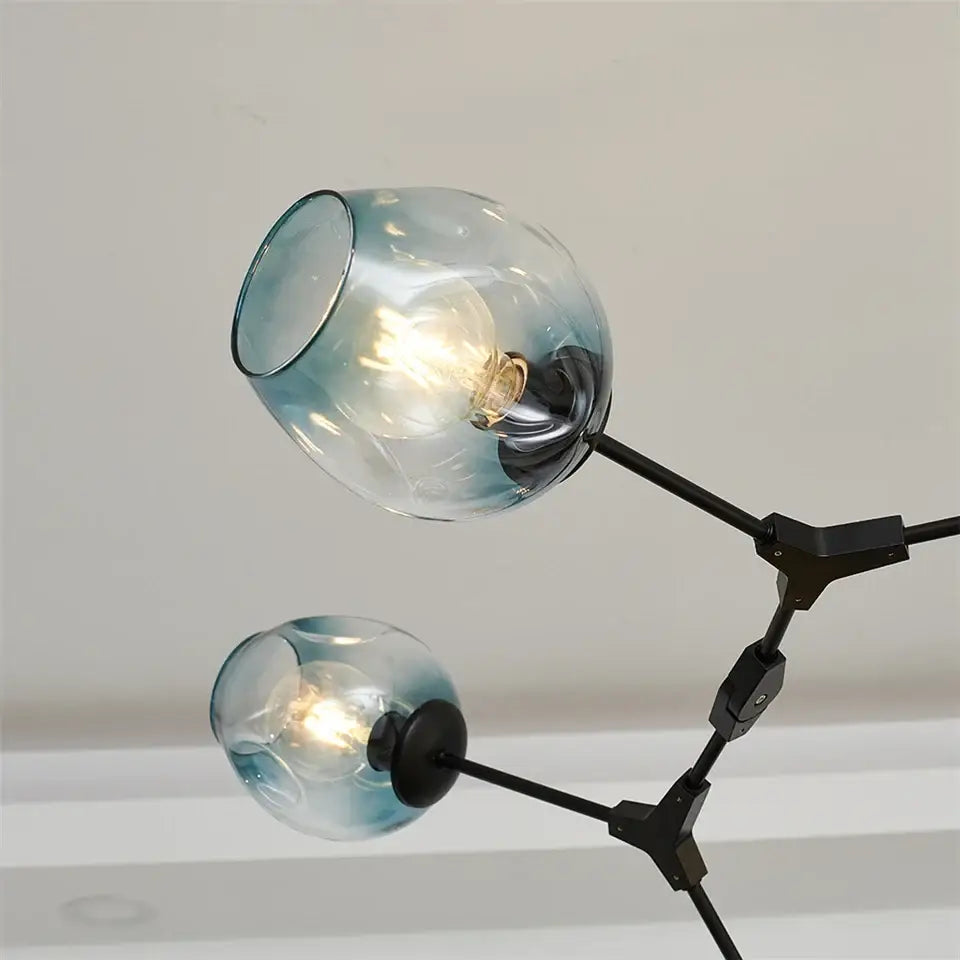 Decorbites modern nordic glass ball led chandelier featuring blue gradient glass ball and black metal arms and joints