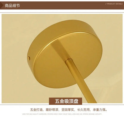 Gold-colored circular ceiling mount with sleek metallic finish and cylindrical stem for decorbites modern nordic glass chandeliers