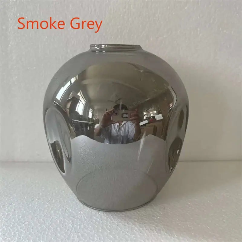 Smoke grey spherical glass lampshade with a reflective glossy finish for DecorBites modern nordic glass chandeliers