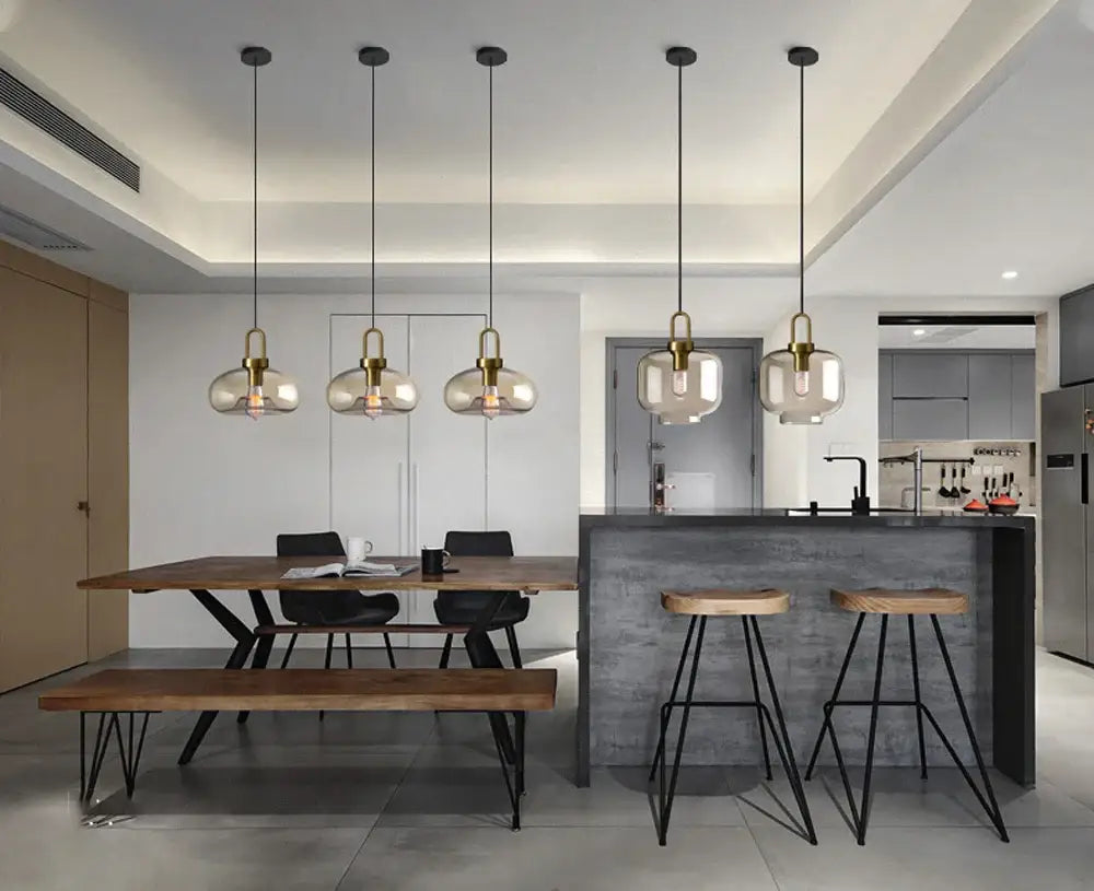 Five brass-finished decorbites™ modern nordic glass pendant lights with frosted shades for kitchen and restaurant use