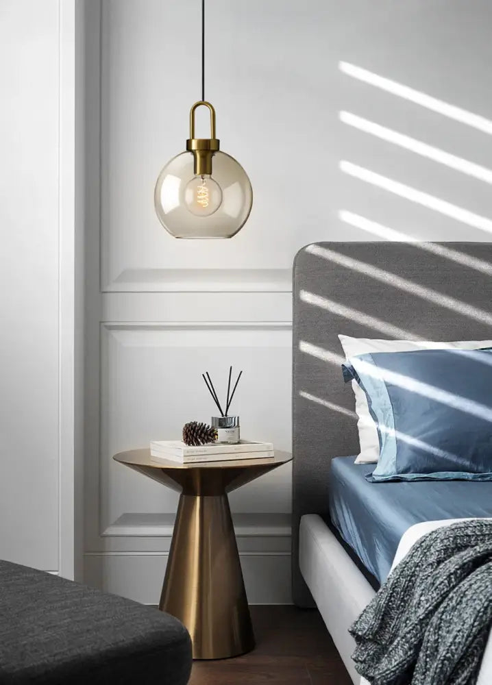 Decorbites modern nordic glass pendant light with brass finish and exposed filament bulb for kitchen and restaurant use