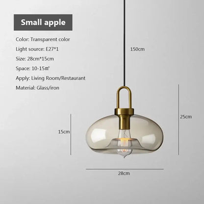 DecorBites modern Nordic glass pendant light with a transparent glass pendant and brass-colored metal fixture for kitchen and restaurant