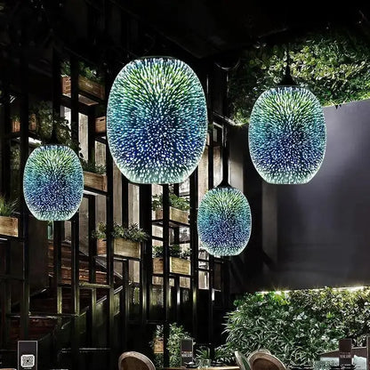 Blue and green spherical glass pendant lights with starburst pattern in modern nordic style for interior lighting