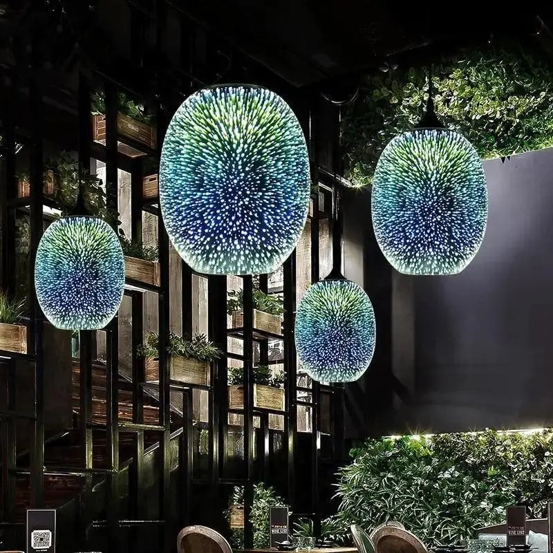 Blue and green spherical glass pendant lights with starburst pattern in modern nordic style for interior lighting