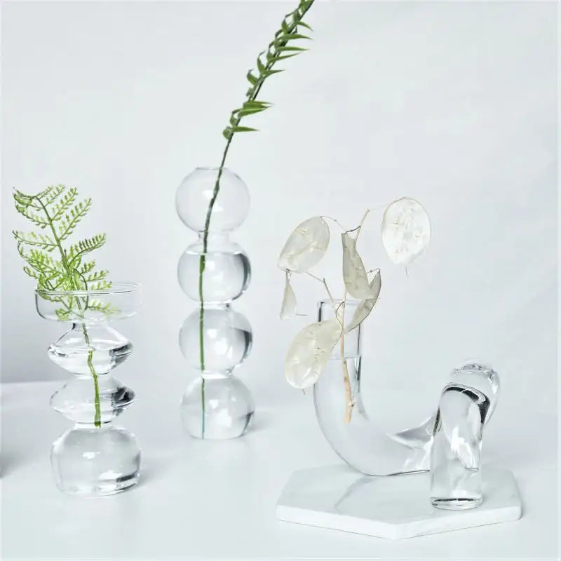 DecorBites™ modern Nordic clear glass vases set with stacked spherical designs holding delicate greenery