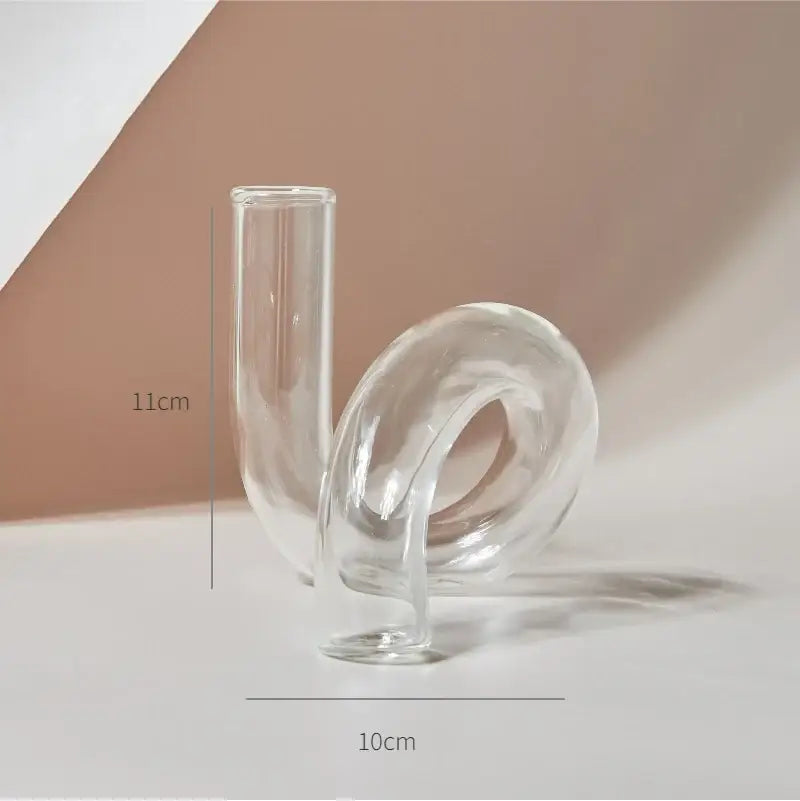 Clear glass DecorBites™ modern nordic vase with sleek cylindrical and curved looped base for home and wedding decor