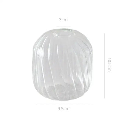 Clear glass vase with vertical ribbed texture 10.5cm tall and 9.5cm wide base for decorate root and hidden width use