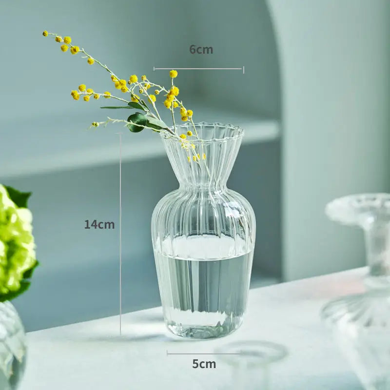 Clear glass decorbites™ modern nordic glass vase with vertical ridges fluted rim holding yellow flowers for decorate root