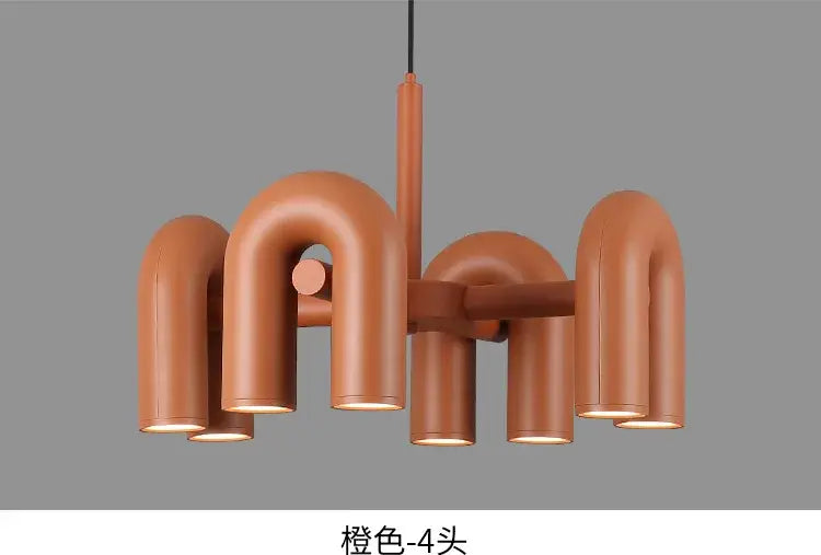 Terracotta modern nordic led ceiling chandelier with sleek metallic finish and curved pipe-like arms by decorbites