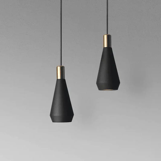 Modern nordic pendant light by decorbites featuring black matte hanging lights with gold toned metallic accents