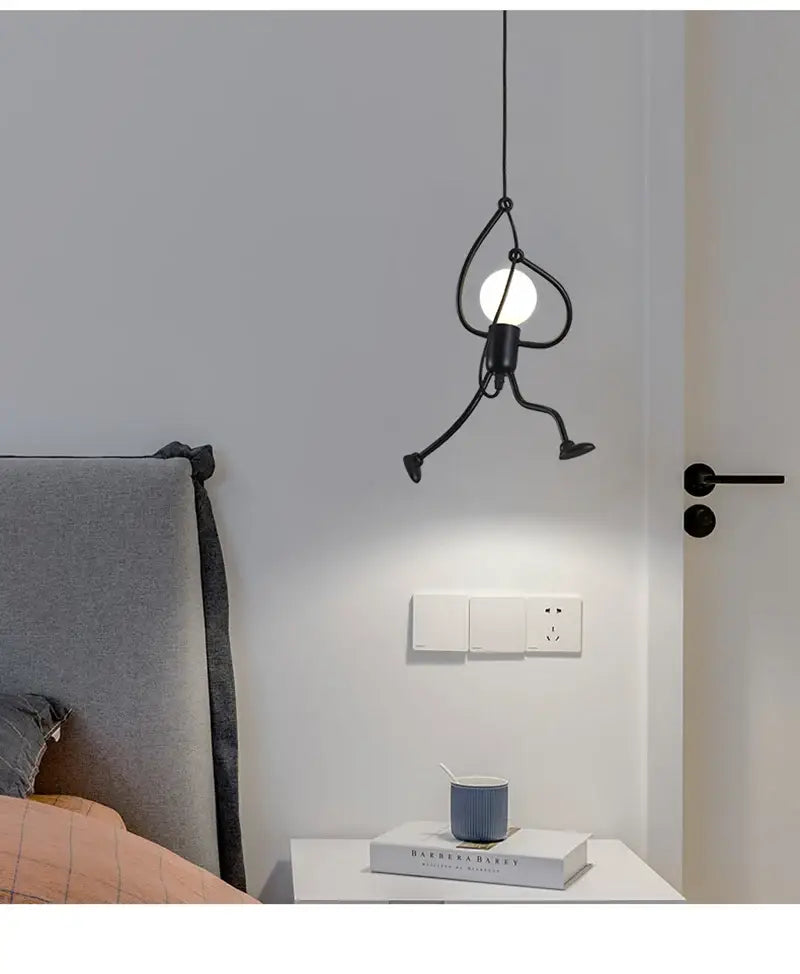 Black metal stick figure pendant light with round bulb center featured in decorbites™ modern nordic pendant light for home decoration