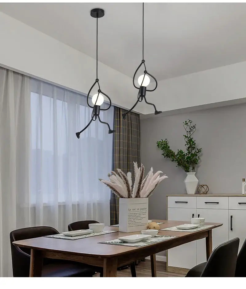 Black metal pendant light with whimsical articulated design and exposed bulbs nordic pendant light for modern decor