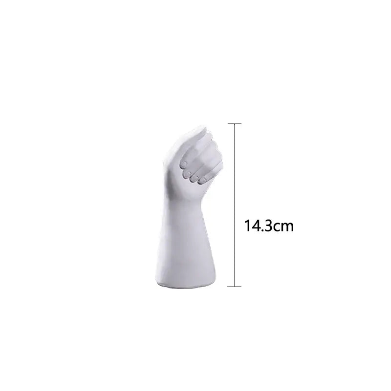 White ceramic hand vase in modern nordic style shaped like a clenched fist 14.3cm tall by DecorBites