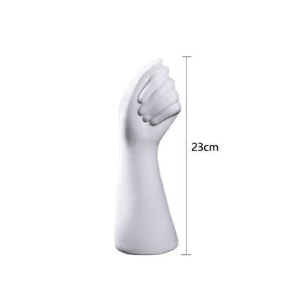 White ceramic sculpture hand vase 23cm tall featuring a modern nordic style design by DecorBites