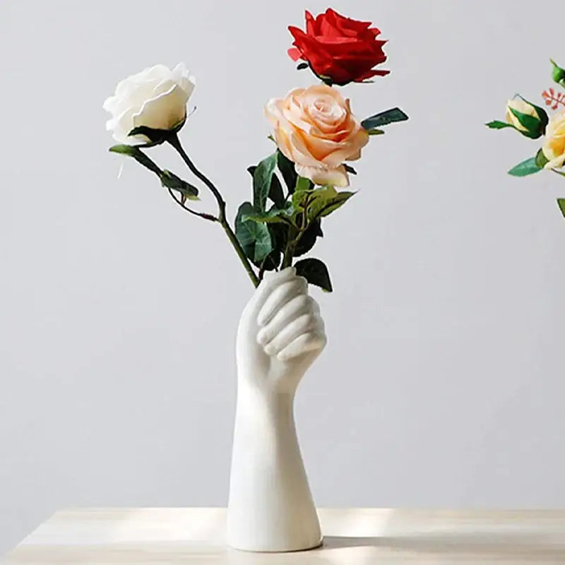 White ceramic hand vase holding roses in modern nordic style by decorbites™ for elegant home decor