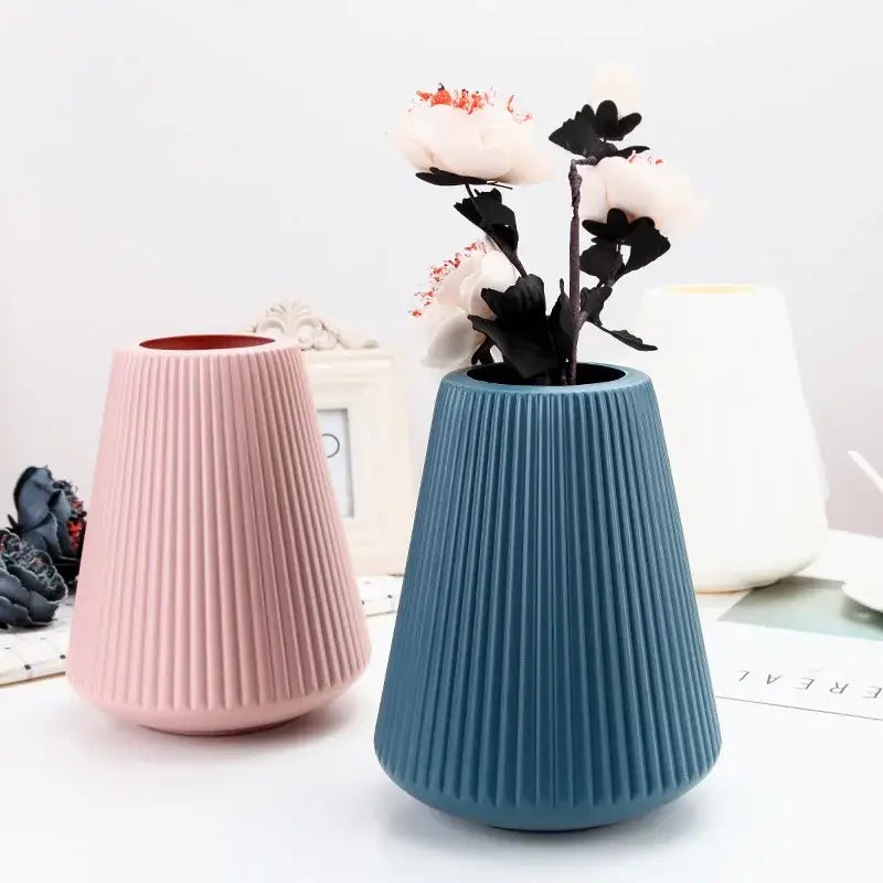 DecorBites™ modern nordic sleek ribbed ceramic vase in soft blue with vertical grooves for creative vase home decor