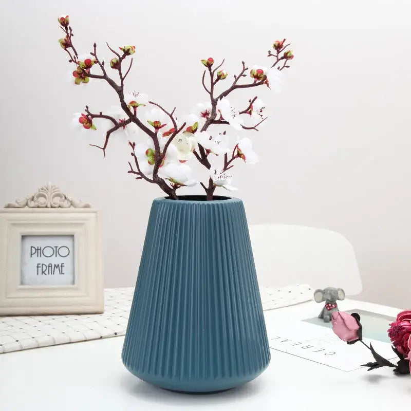Decorbites™ modern nordic sleek teal-blue ceramic vase with vertical ridges holds white blossoms for home decor creative vase home