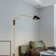 Gold-finished decorbites modern nordic anneke wall sconce with adjustable black conical shade for elegant lighting