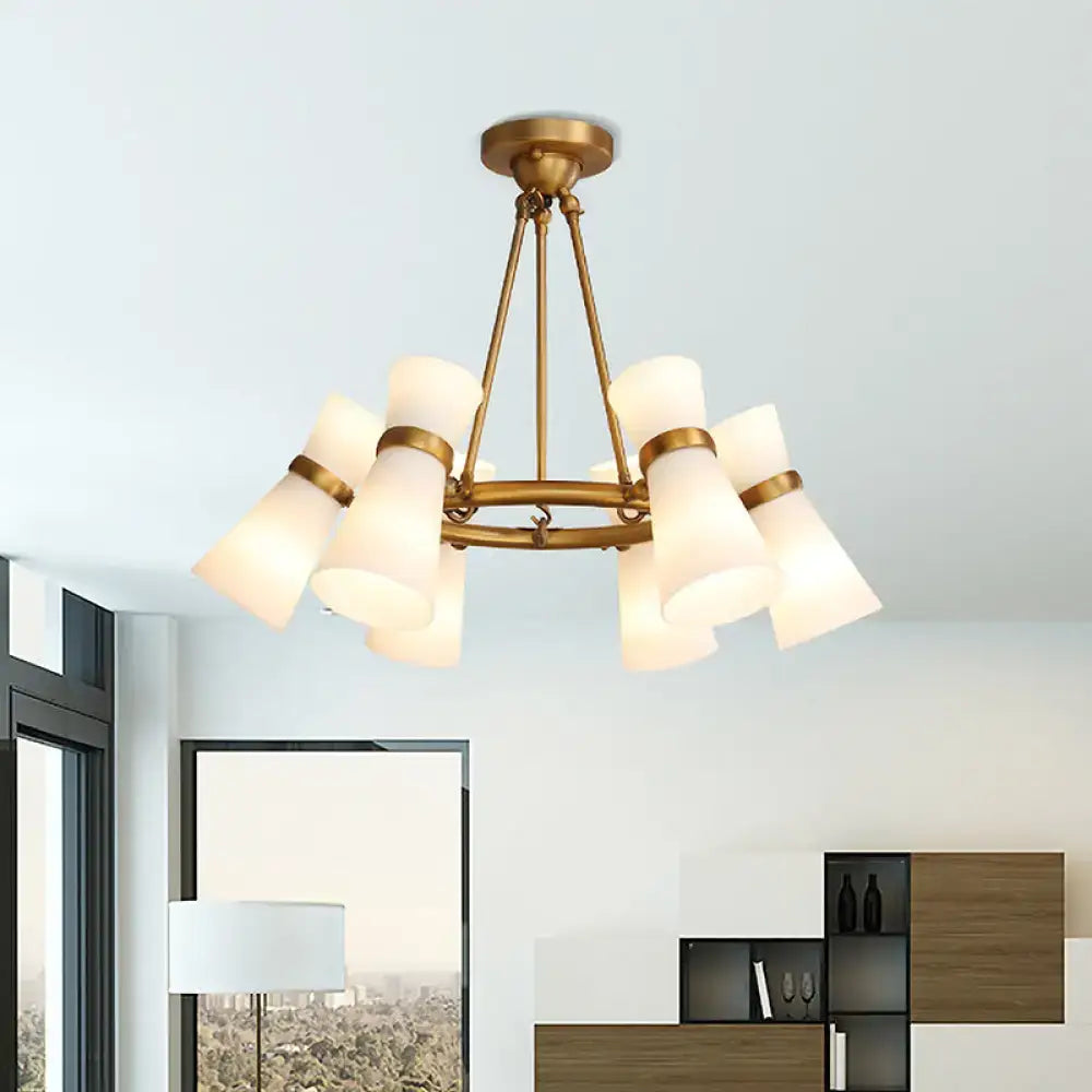Brass-finished decorbites modern opal glass wide flare pendant with eight frosted glass shades in circular pattern