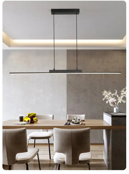 Modern black rectangular pendant light with sleek minimalist design hanging above dining table for dining room use