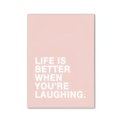 Pink aesthetic rectangular wall art by decorbites featuring white text life is better when youre laughing for room decor