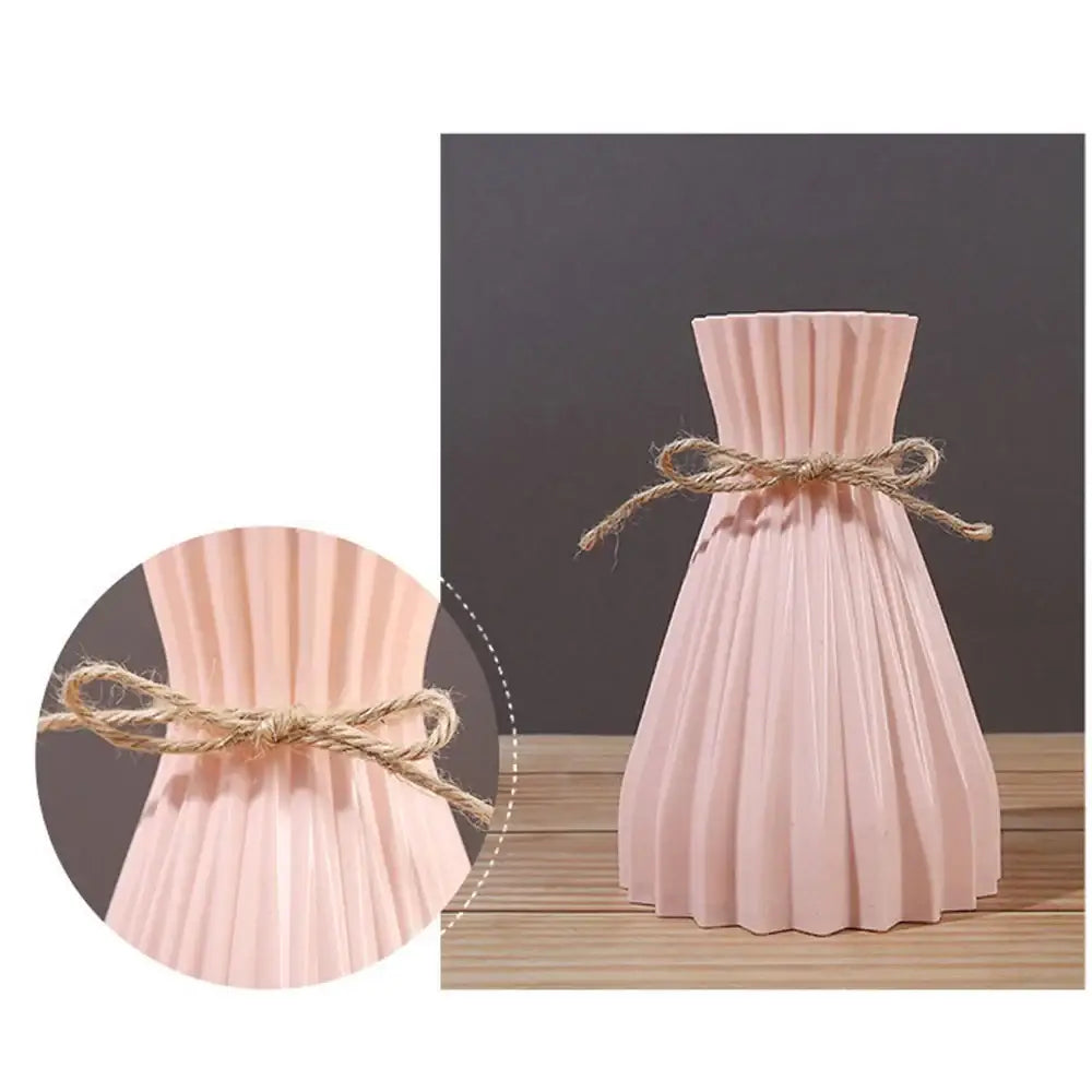 A blush pink pleated ceramic flower vase with rustic twine bow for modern simple dry flowers by decorbites