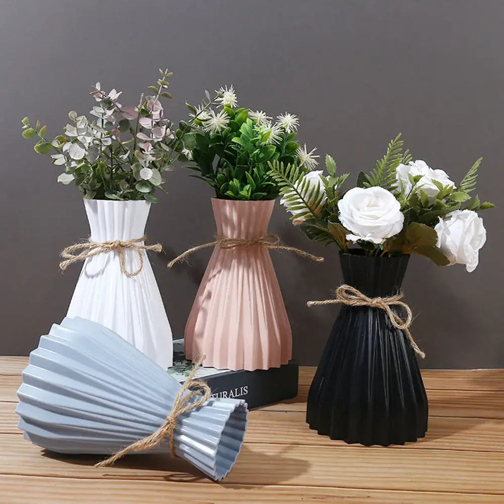 Set of three DecorBites modern simple ceramic flower vases in white blush pink and black with rustic twine ties for dry flowers