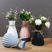 Set of three DecorBites modern simple ceramic flower vases in white blush pink and black with rustic twine ties for dry flowers