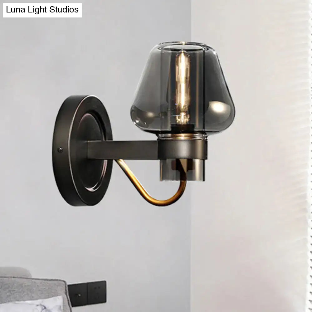 Modern smoked glass mushroom sconce lighting fixture with dark bronze finish and smoked glass shade for bedroom use